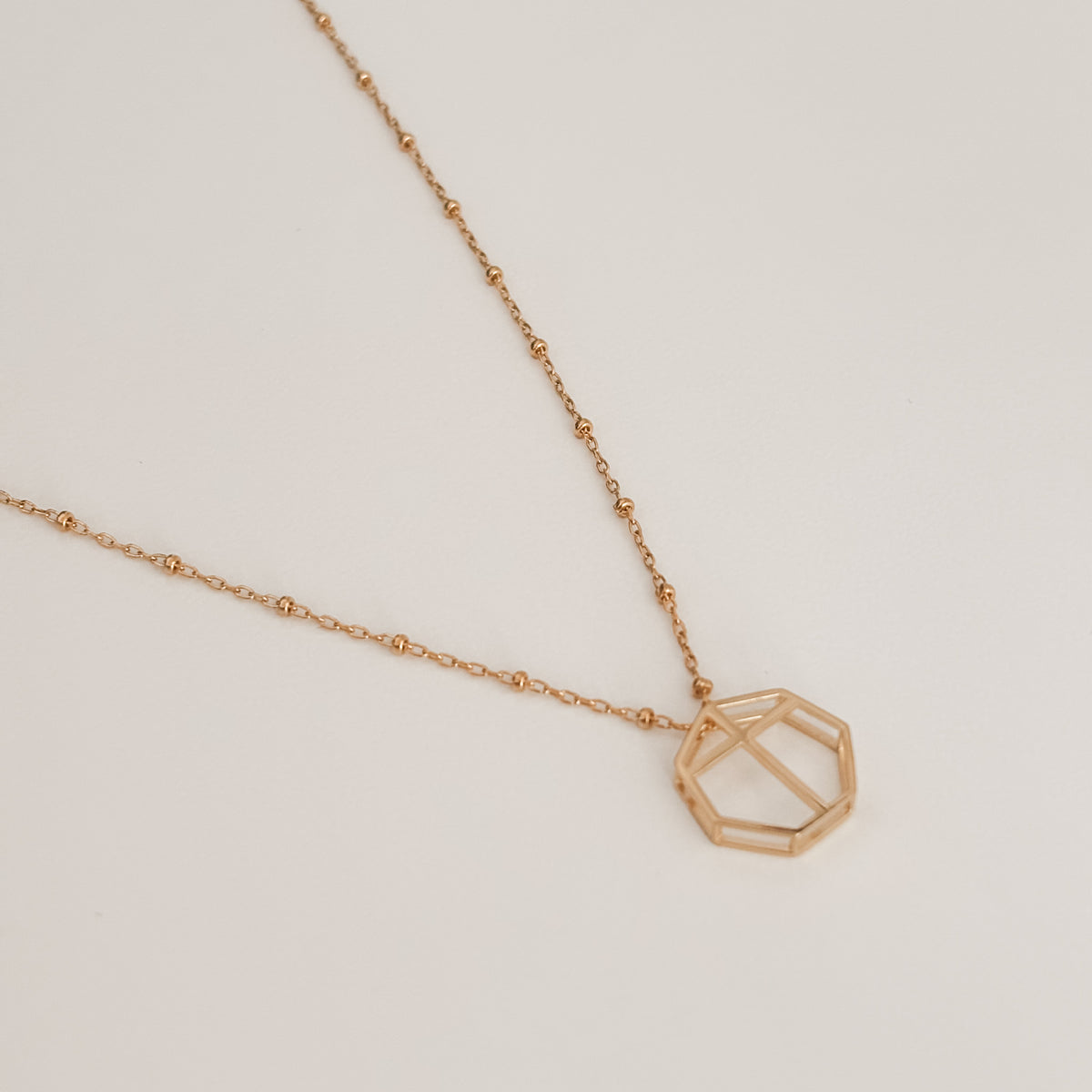 Polished silver, 14k gold plated brass 3D printed metal geometric pendant on satellite chain. 16 inches chain length. 