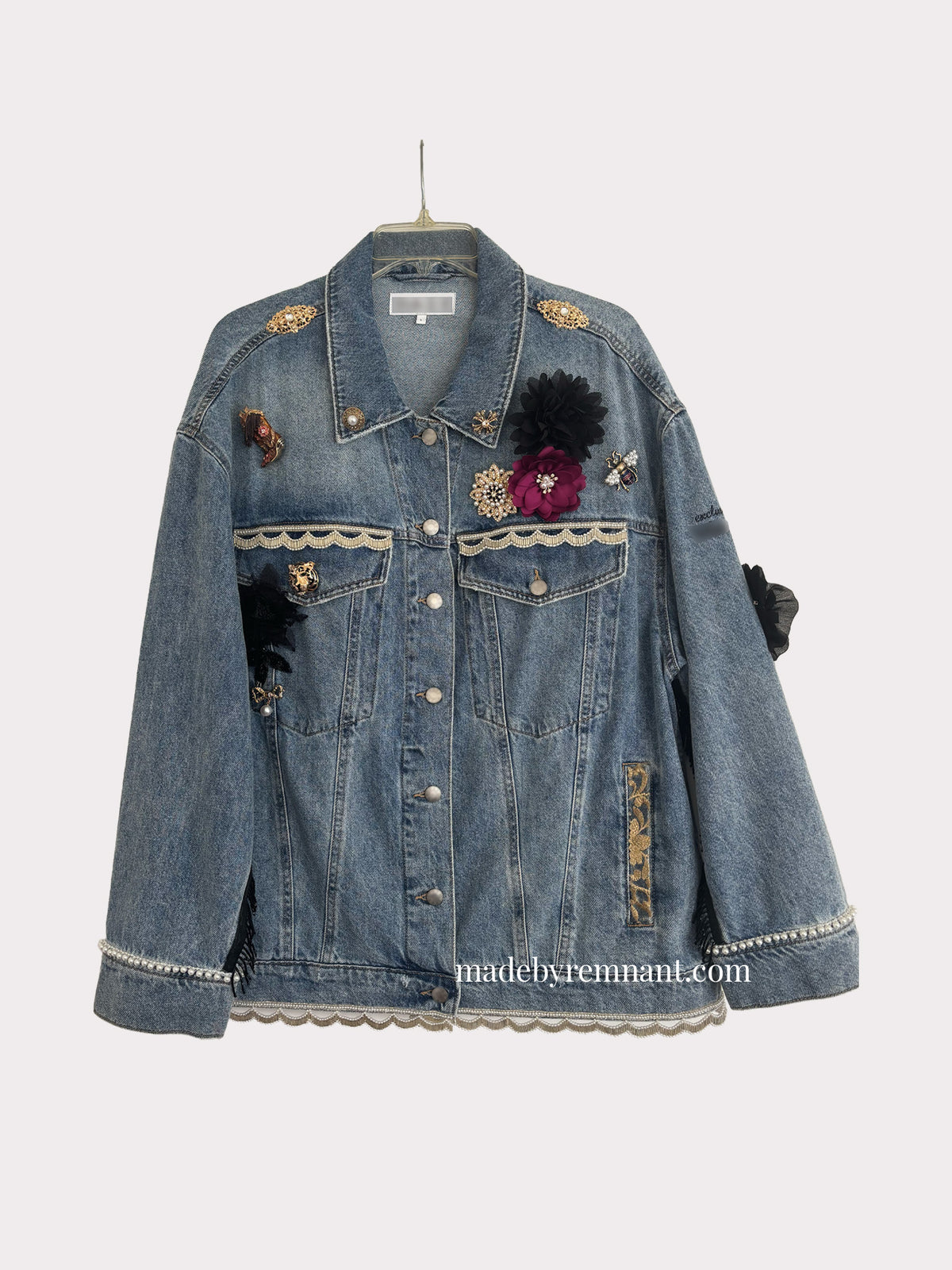 Brooch embellished Custom painted denim jacket. 100% cotton denim. 